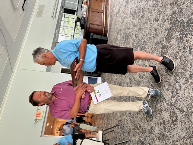 Paris Sterrett, Second Vice President of the Middle Atlantic Blind Golf Association (MABGA), presents a plaque to Chris Barletta, Head Pro of Bala Country Club, in recognition of the club’s support for hosting MABGA golf outings. The presentation took place during MABGA's outing on July 29, 2024, highlighting the club's commitment to supporting blind golf and fostering inclusivity in the sport.